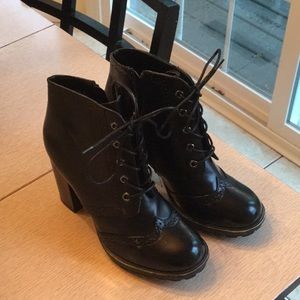High heeled combat boots